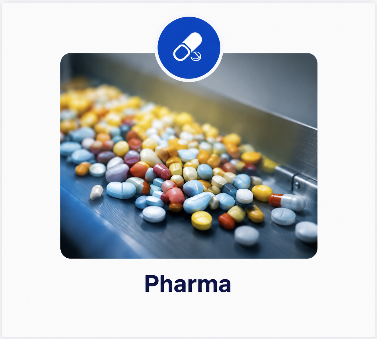 Automated pharmaceutical production line in a sterile, stainless steel facility.